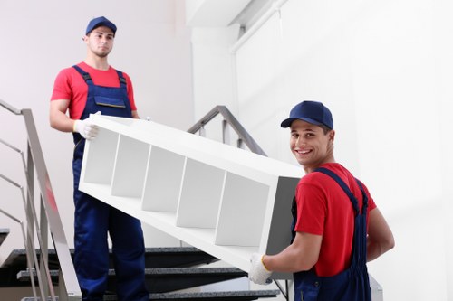 Man and van loading service with moving items at collection point