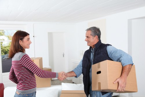 Man and van team reviewing safety procedures before a move