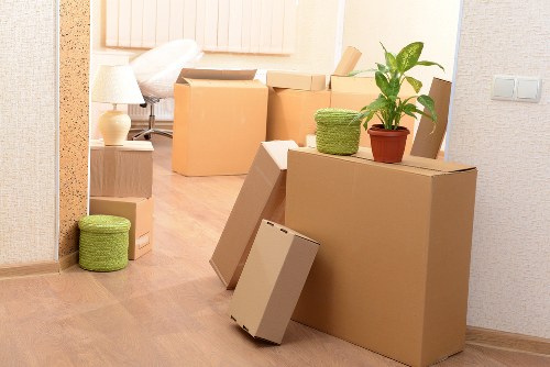 Packed student belongings ready for transport in a London flat removal