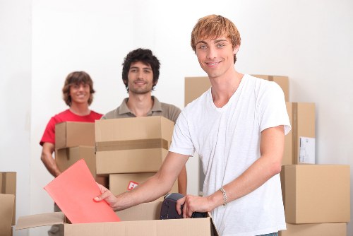Business staff preparing boxes and labels for an office relocation